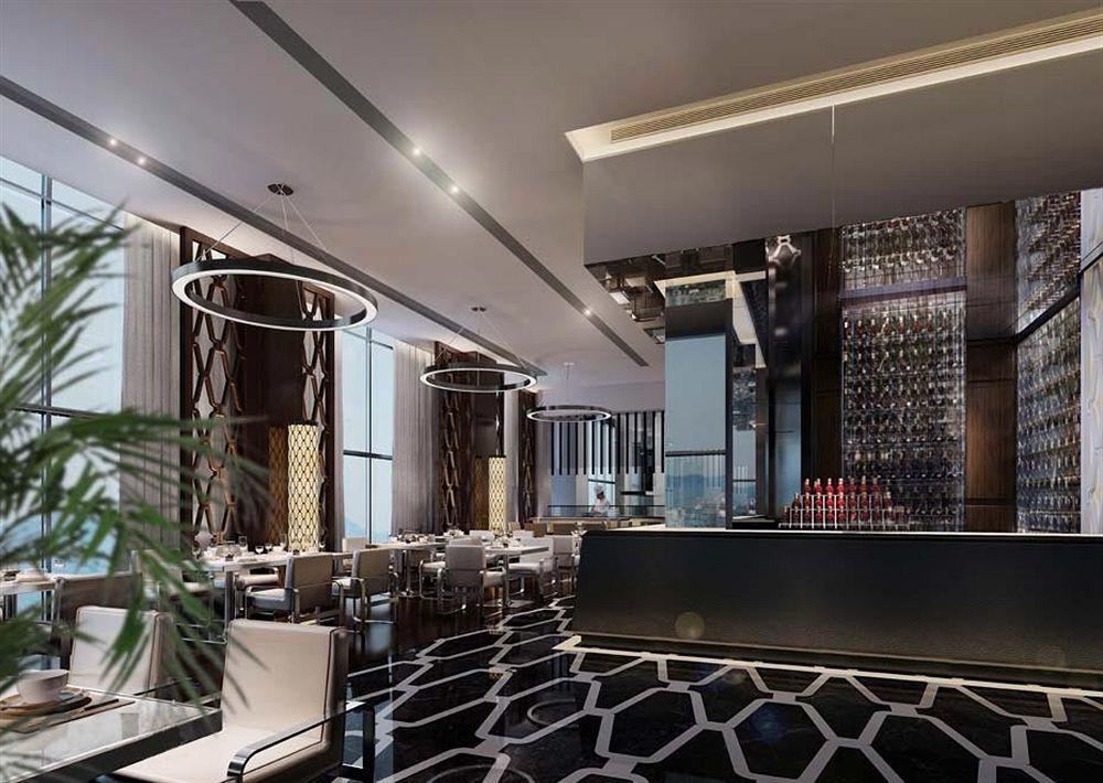 Ramee Grand Hotel And Spa Manamah Buitenkant foto The interior of the restaurant