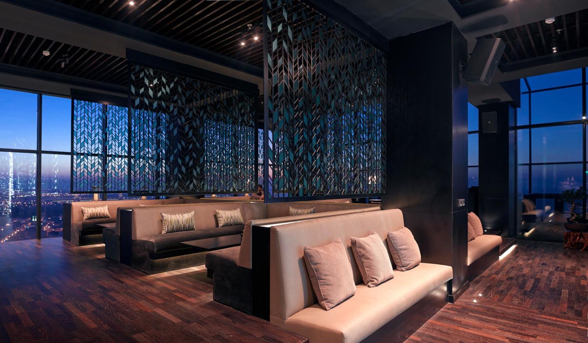 Ramee Grand Hotel And Spa Manamah Buitenkant foto The interior of the lounge
