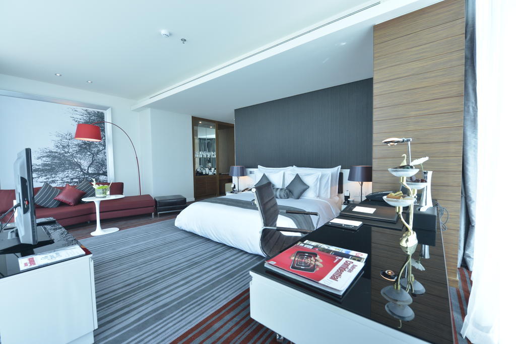 Ramee Grand Hotel And Spa Manamah Kamer foto A bedroom at the hotel